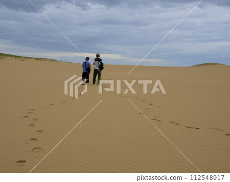 Footprints of two people in Tottori Sand Dunes Hamasaka, Tottori City, Tottori Prefecture 112548917