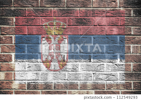 Serbia flag on old brick wall Serbia flag on old brick wall 112549293