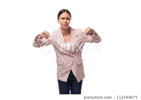 young beautiful business woman leader with a ponytail hairstyle dressed in a beige jacket doubts and young beautiful business woman leader with a ponytail hairstyle dressed in a beige jacket doubts and 112549675