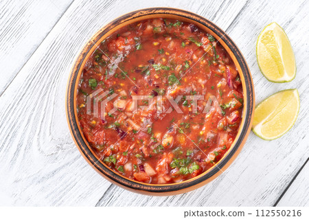 Bowl of salsa 112550216