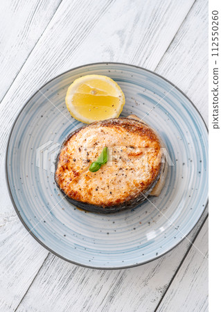 Portion of salmon medallion Portion of salmon medallion 112550260