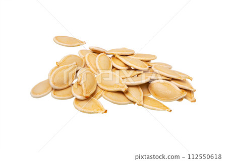 Raw pumpkin seeds on white Raw pumpkin seeds on white 112550618