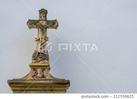Historical cross of a tomb, church in Dlouhomilov, Czechia Historical cross of a tomb, church in Dlouhomilov, Czechia 112550625