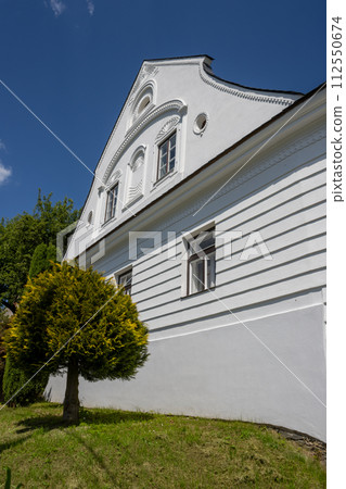 White historical house, Dlouhomilov, Czechia 112550674