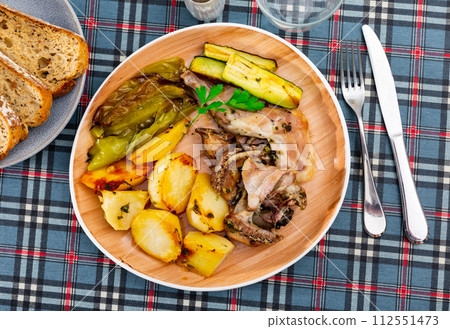 Rabbit meat prepared with vegetables Rabbit meat prepared with vegetables 112551473