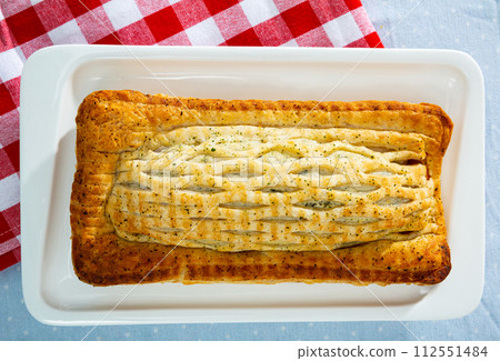 Top view of puff pastry pie with salmon Top view of puff pastry pie with salmon 112551484