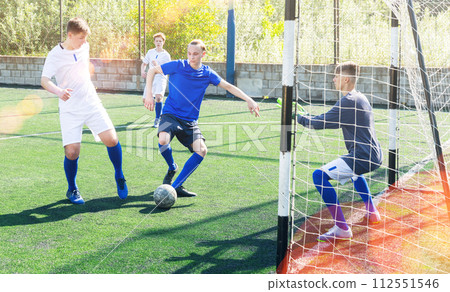 Football game - defender knocks ball from attacker Football game - defender knocks ball from attacker 112551546