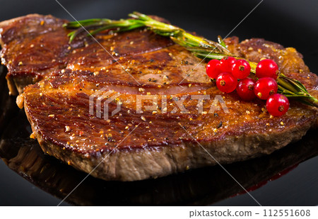 Grilled beef steak with rosemary Grilled beef steak with rosemary 112551608