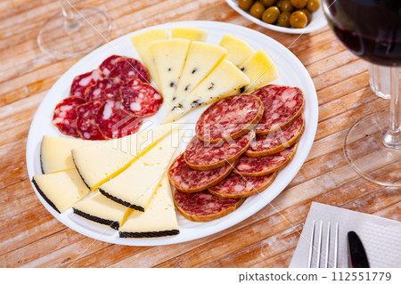 Traditional spanish snack tapas on a plate Traditional spanish snack tapas on a plate 112551779