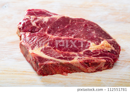 Raw veal chop Raw veal chop 112551781