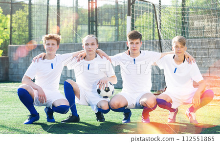 Portrait Of male high school soccer team on field 112551865