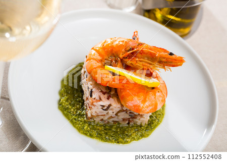 Baked tiger shrimps on rice pillow Baked tiger shrimps on rice pillow 112552408