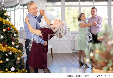 Elderly man and elderly woman dance waltz 112552502