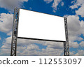 Mock up: blank white billboard and white clouds in the blue sky 112553097