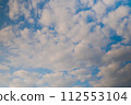 View of white clouds in the blue sky - cloudscape 112553104