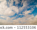 View of white clouds in the blue sky - cloudscape 112553106