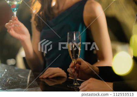 Couple drinking champagne Couple drinking champagne 112553513