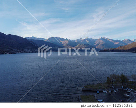 A beautiful view across the water with coastal landscape scenery changing along  112555381