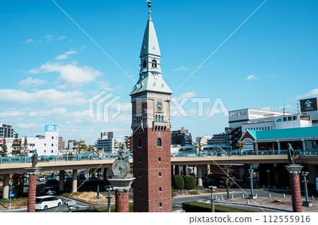 Clock tower in front of Kurashiki station 112555916