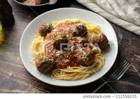 italian meat balls with spaghetti marinara sauce 112556235