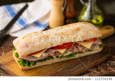 submarine sandwich with turkey and black forest ham submarine sandwich with turkey and black forest ham 112556246