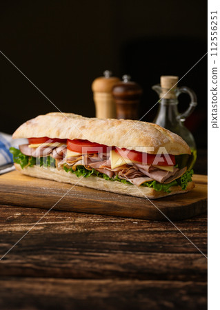 submarine sandwich with turkey and black forest ham submarine sandwich with turkey and black forest ham 112556251