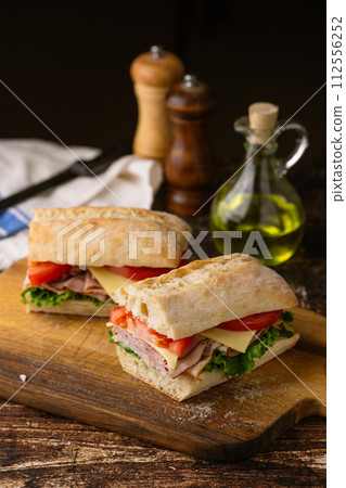 submarine sandwich with turkey and black forest ham 112556252
