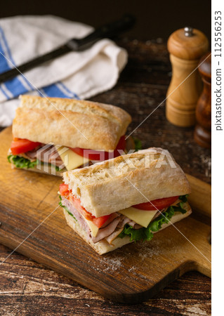 submarine sandwich with turkey and black forest ham submarine sandwich with turkey and black forest ham 112556253