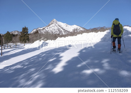 Walking in the snow with snowshoes, Kagami Oyama Walking in the snow with snowshoes, Kagami Oyama 112558209