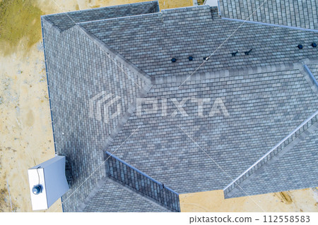 Asphalt shingles roof top newly constructed house Asphalt shingles roof top newly constructed house 112558583