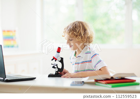 School kids with microscope. Science class. 112559523
