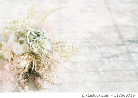 Dried flowers in a gray background Dried flowers in a gray background 112560739