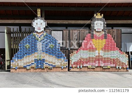 Giant Hina decorations made from empty cans in front of Akechi Railway Iwamura Station 112561179