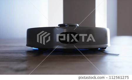 Vacuum Robot auto cleaning at home, floor. 3d rendering. Vacuum Robot auto cleaning at home, floor. 3d rendering. 112561275