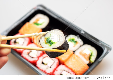 Bright beautiful rolls with fish close up Bright beautiful rolls with fish close up 112561577