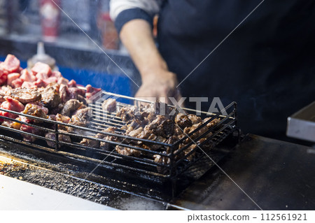 Food stalls at Raohe Street Night Market in Taiwan Food stalls at Raohe Street Night Market in Taiwan 112561921