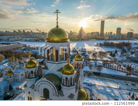 Winter Yekaterinburg and Temple on Blood in beautiful blue clear sunset. Aerial view of Yekaterinburg, Russia. Translation of the text on the temple Winter Yekaterinburg and Temple on Blood in beautiful blue clear sunset. Aerial view of Yekaterinburg, Russia. Translation of the text on the temple 112561999