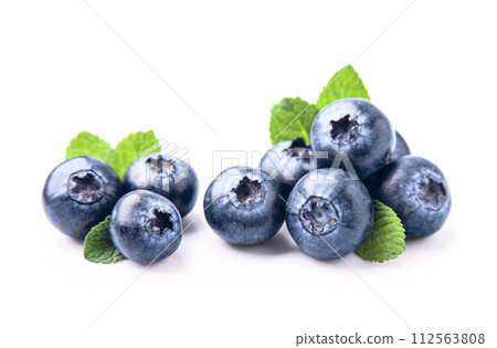 Blueberries with mint on white backgrounds 112563808