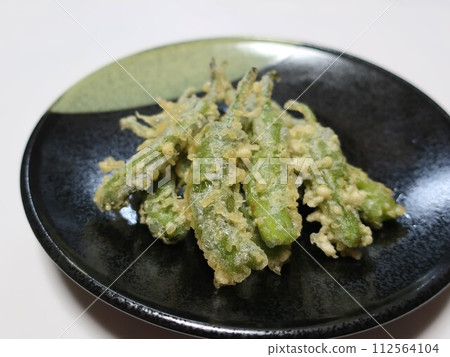 Delicious tempura with shishito peppers Delicious tempura with shishito peppers 112564104
