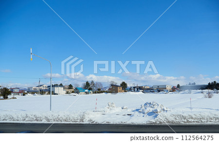 Snowy landscape in the suburbs of Asahikawa, Hokkaido in winter 112564275
