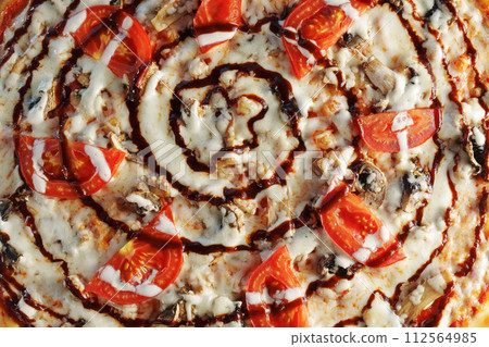 Freshly baked pizza with ripe tomatoes, earthy mushrooms, and melted cheese, ready to be enjoyed. Freshly baked pizza with ripe tomatoes, earthy mushrooms, and melted cheese, ready to be enjoyed. 112564985