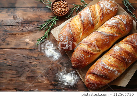 Bagutte on wooden table background ,top view, AI generated 112565730