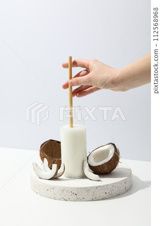 Coconut milk, concept of tasty and natural drink Coconut milk, concept of tasty and natural drink 112568968