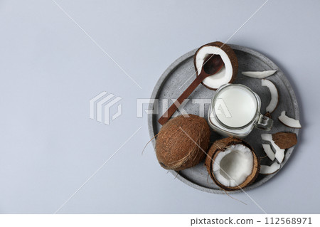 Coconut milk, concept of tasty and natural drink Coconut milk, concept of tasty and natural drink 112568971