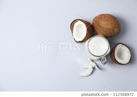 Coconut milk, concept of tasty and natural drink Coconut milk, concept of tasty and natural drink 112568972