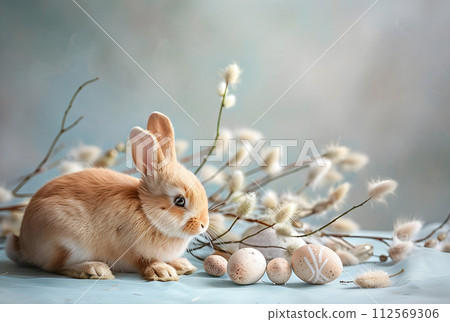 Rabbit, painted eggs and willow branches, soft muted pastel gray-blue color, concept and idea of  a happy Easter day, AI-generated item 112569306