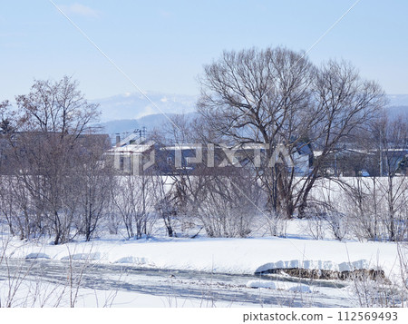 Snowy landscape in the suburbs of Asahikawa, Hokkaido in winter 112569493