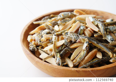 Snack Almonds and small fish 112569740