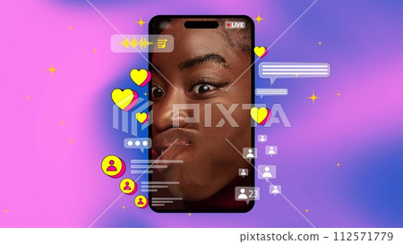 Funny video content. Young African girl leading live stream, leaning closely to phone. Entertainment with followers. Comic blogger. Creative design 112571779