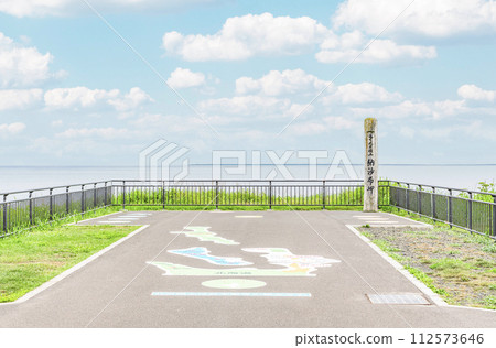Nemuro City, Hokkaido, the easternmost tip of the mainland, Cape Nosappu in summer, the monument of Cape Nosappu and the surrounding hazy scenery Nemuro City, Hokkaido, the easternmost tip of the mainland, Cape Nosappu in summer, the monument of Cape Nosappu and the surrounding hazy scenery 112573646
